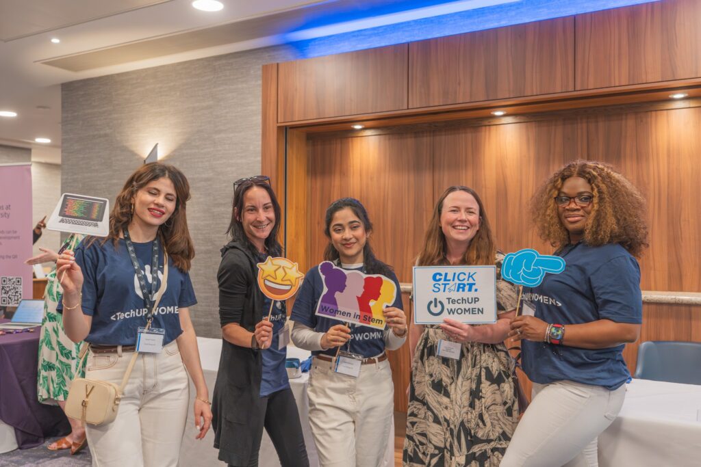 Click start TechUp women event with 4 women posing with event merch. Image Source: Tianyuan Sun, Durham University